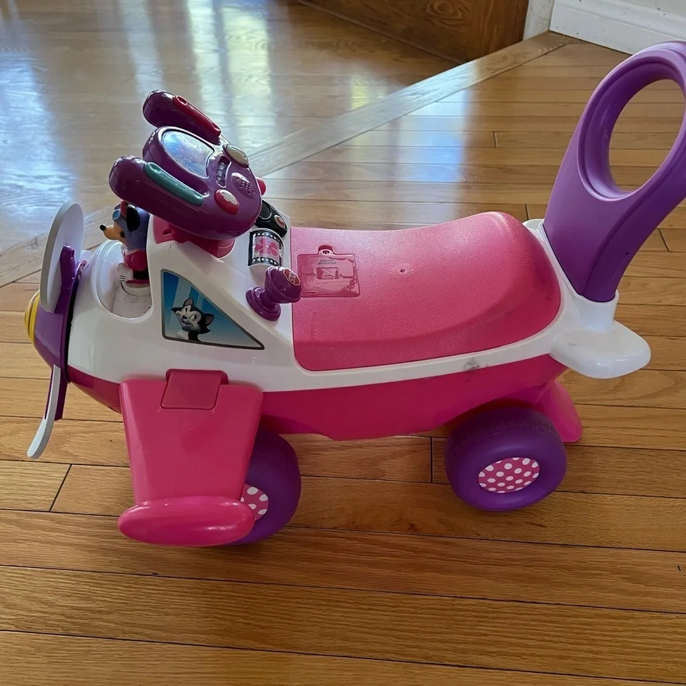Disney’s Minnie airplane Pink + Purple Ride-On Airplane Toy
